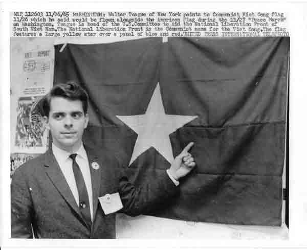 Walter in 1965 in Washington DC with NLF flag.